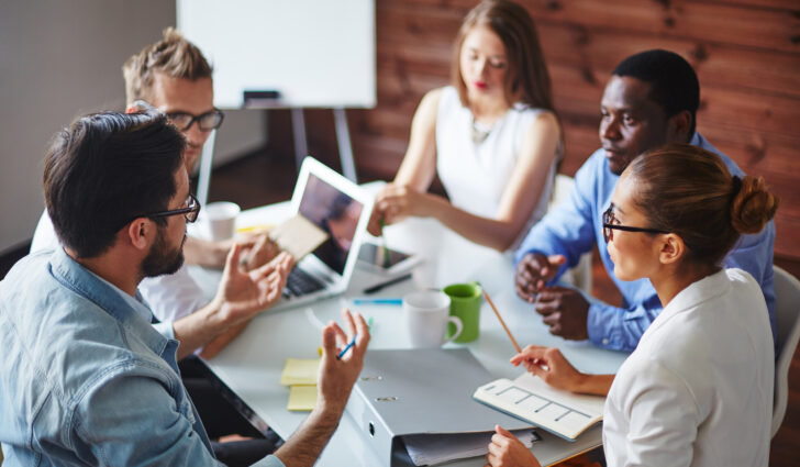 Group of multi-ethnic business partners discussing ideas